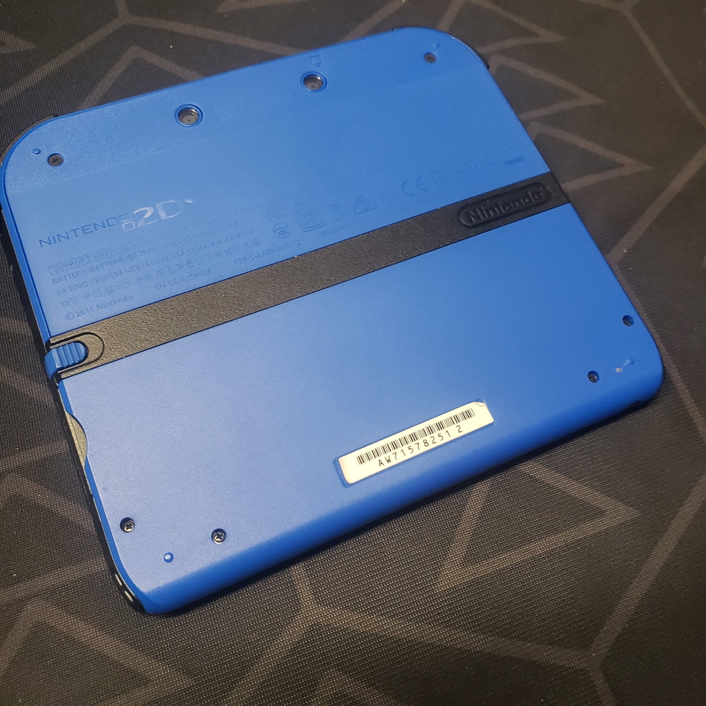 Image shows the back of a Nintendo 2DS Console: Electric Blue 2 (FTR-001) gaming console