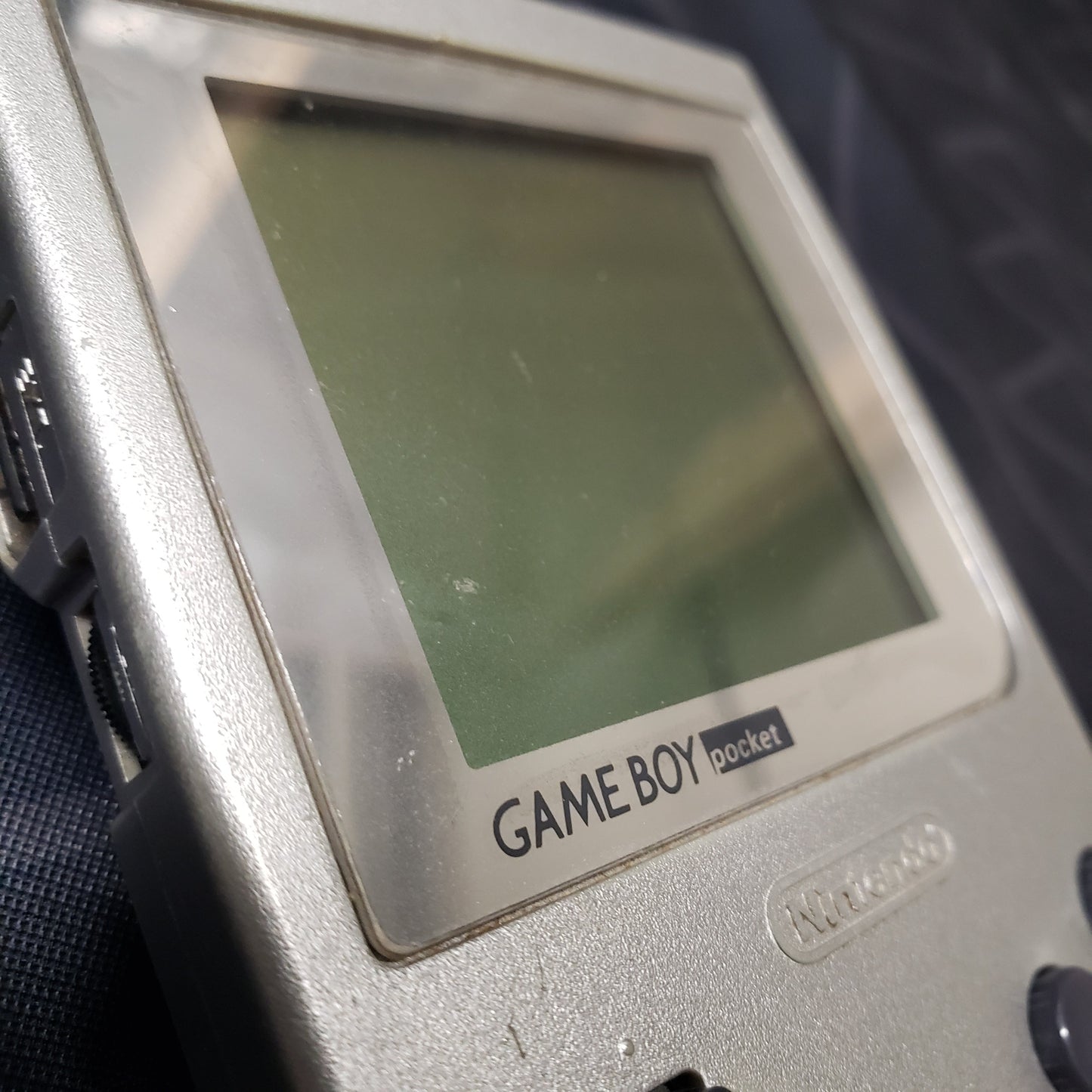 Image shows a close up of the screent of a Nintendo Game Boy Pocket gaming console