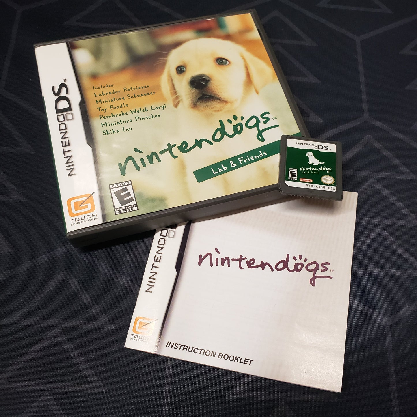Image shows the case, manual and cartridge for the video game Nintendogs: Lab & Friends for Nintendo DS