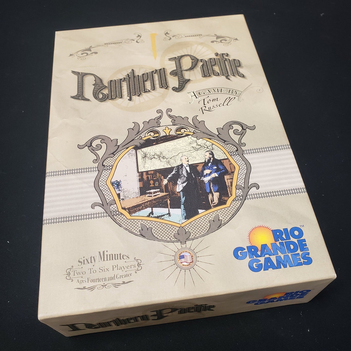 Image shows the front cover of the box of the Northern Pacific board game