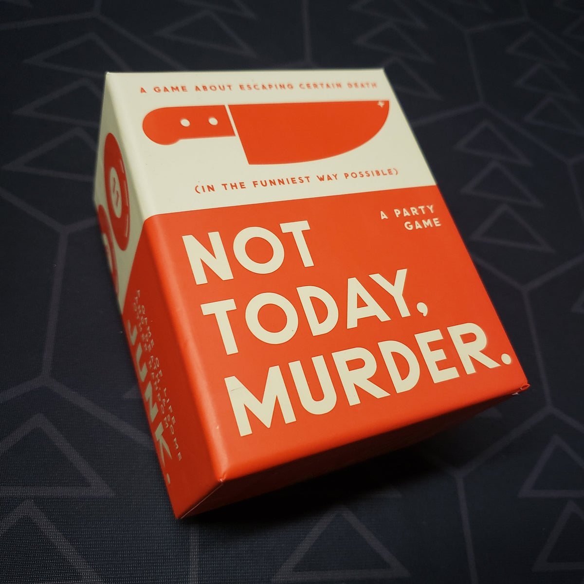 Image shows the front cover of the box for the Not Today, Murder card game