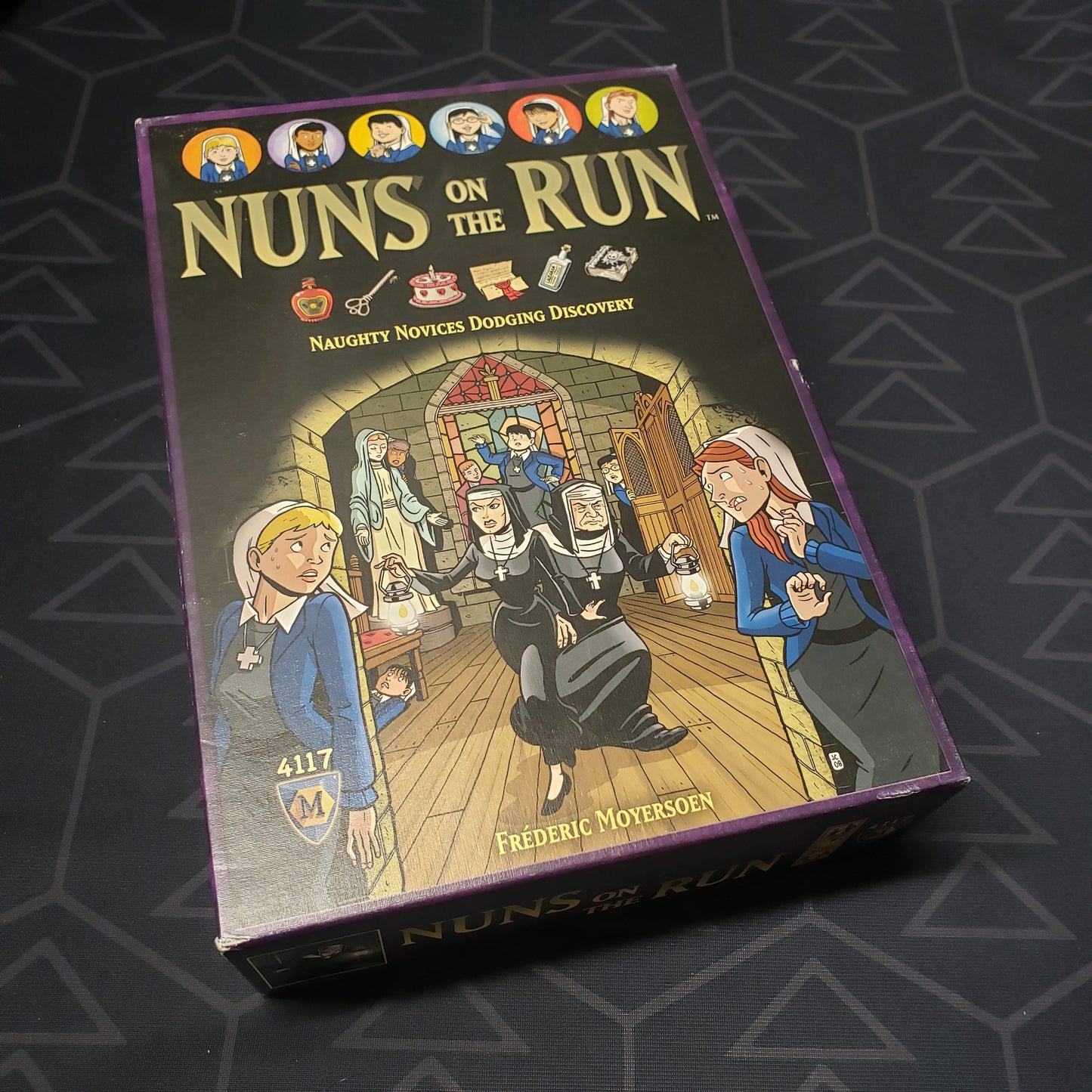 Image shows the front cover of the box of the Nuns on the Run board game