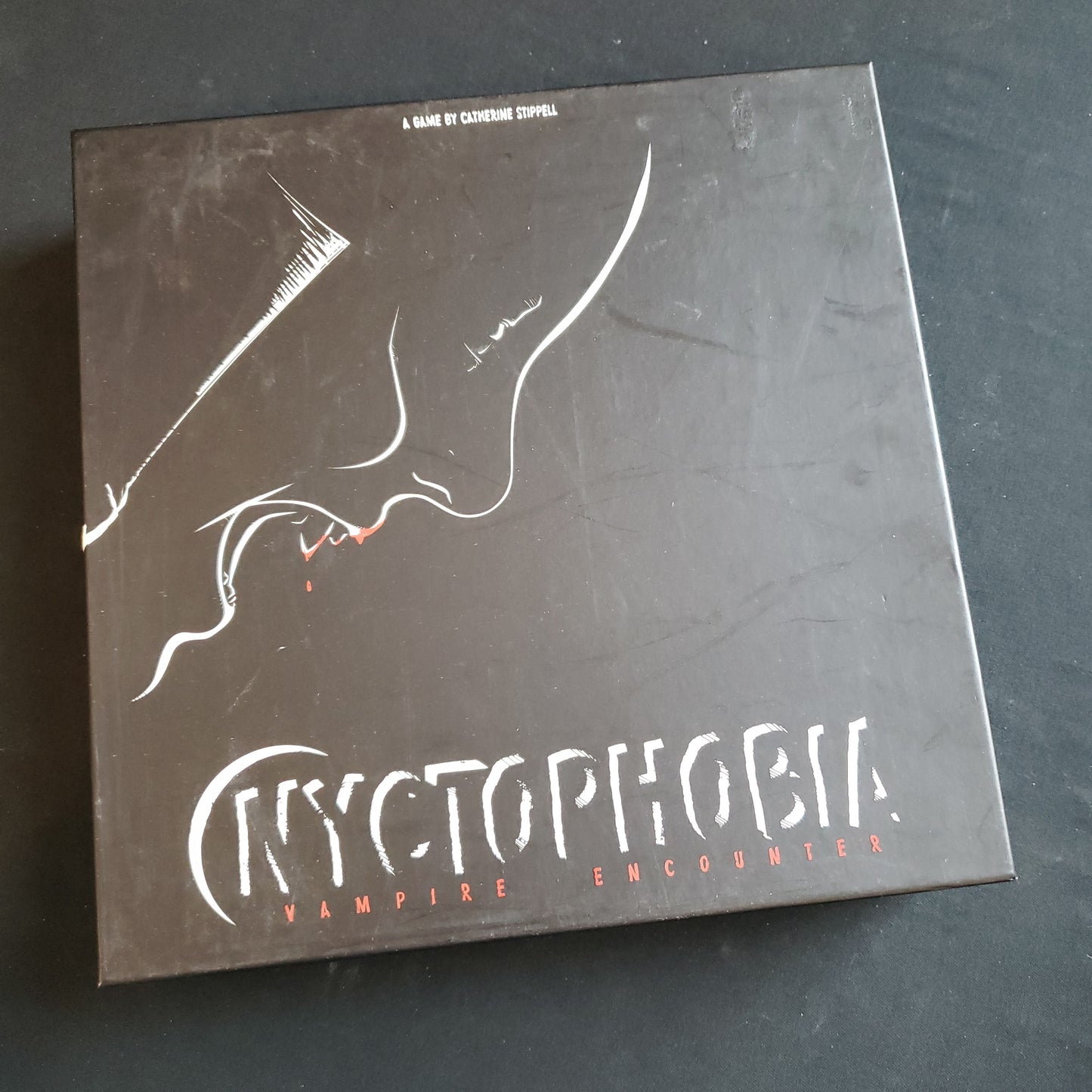 Image shows the front cover of the box of the Nyctophobia: Vampire Encounter board game