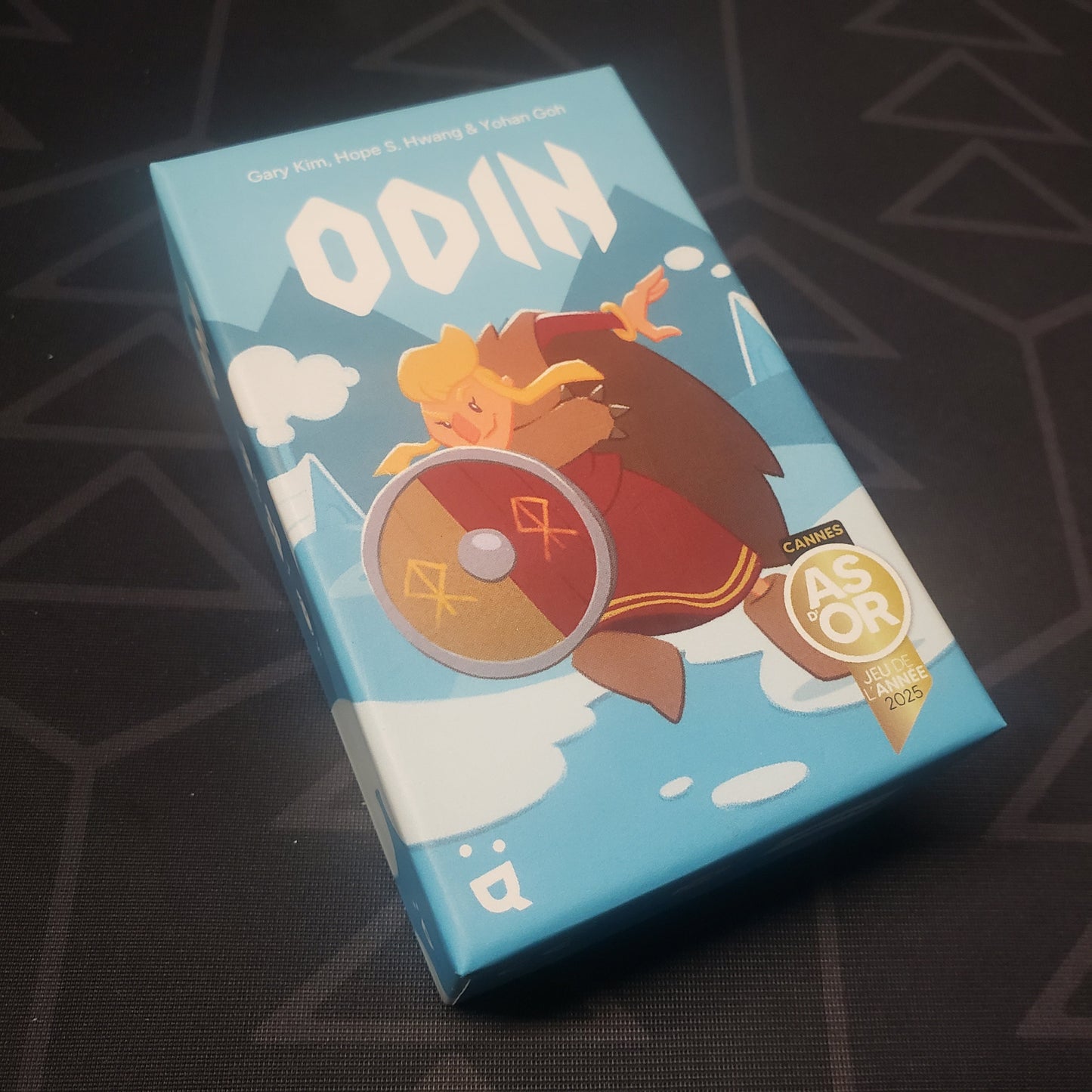 Image shows the front cover of the box for the Odin card game
