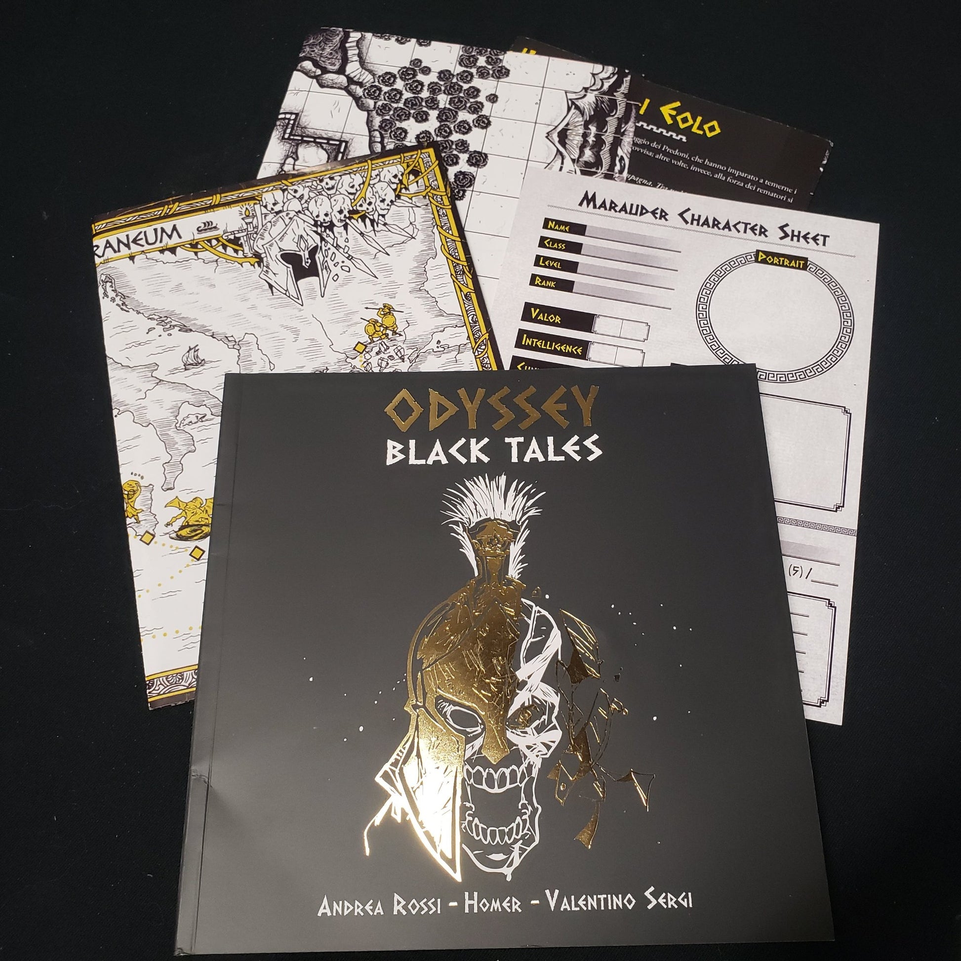 Image shows the front cover of the Odyssey: Black Tales roleplaying game book, along with various maps and character sheets