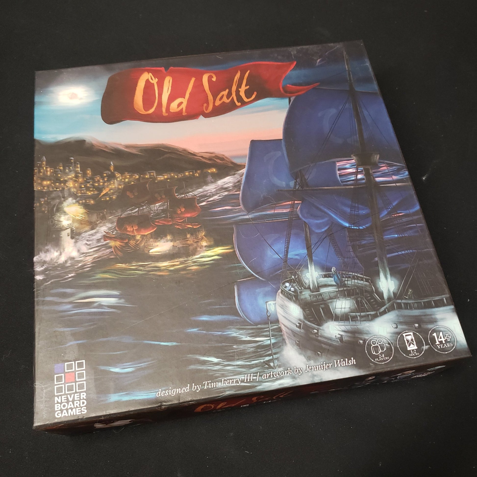 Image shows the front cover of the box of the Old Salt board game