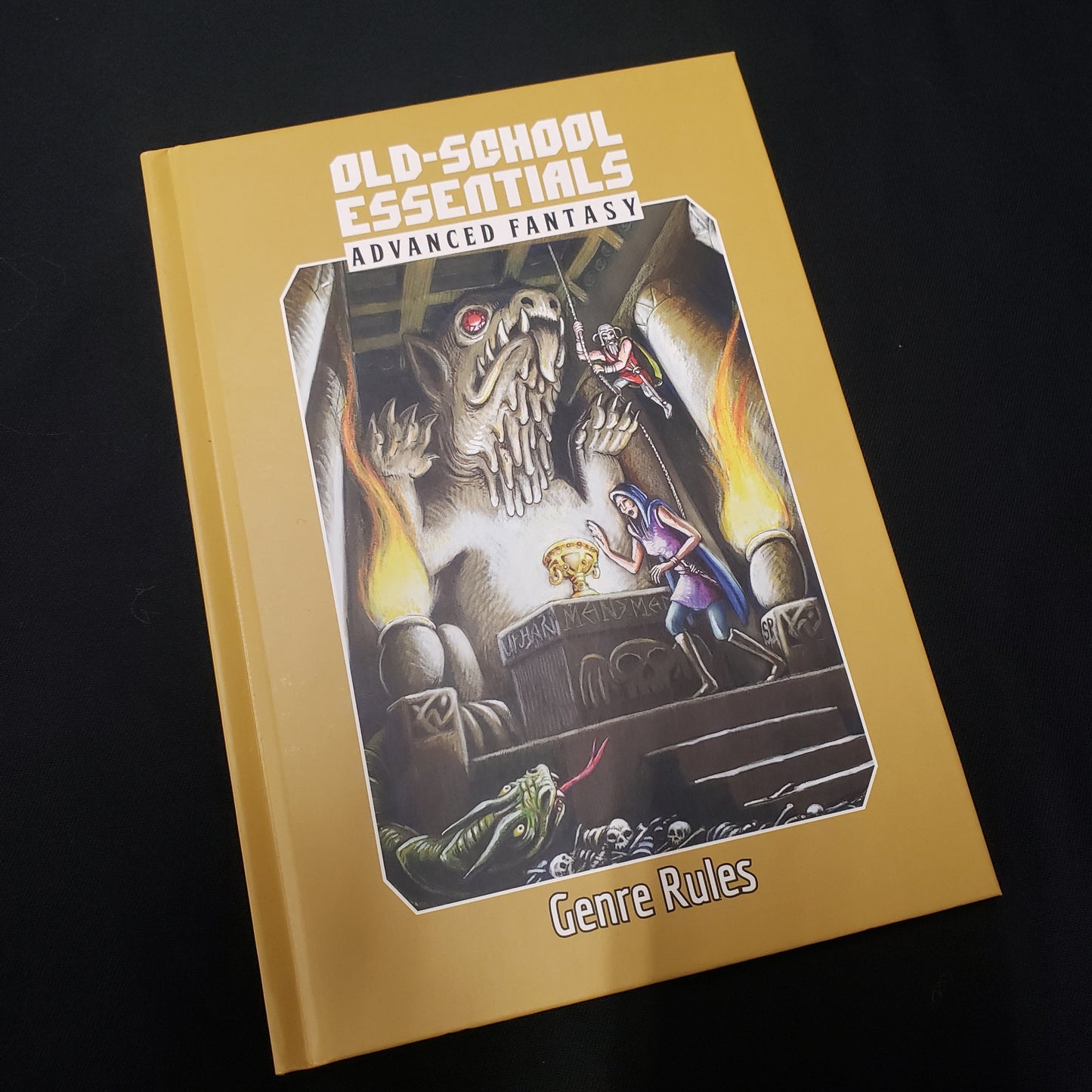 Image shows the front cover of the Genre Rules book for the Old-School Essentials roleplaying game
