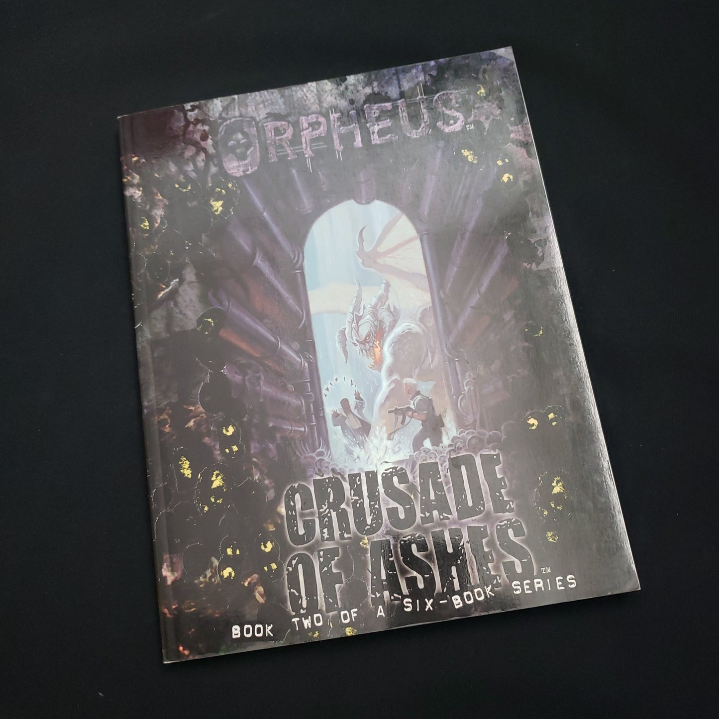 Image shows the front cover of the Crusade of Ashes book for the Orpheus roleplaying game