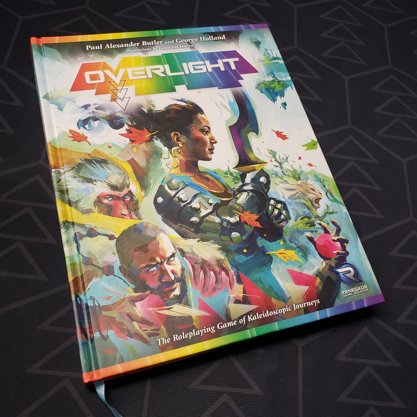 Image shows the front cover of the core rulebook for the roleplaying game Overlight