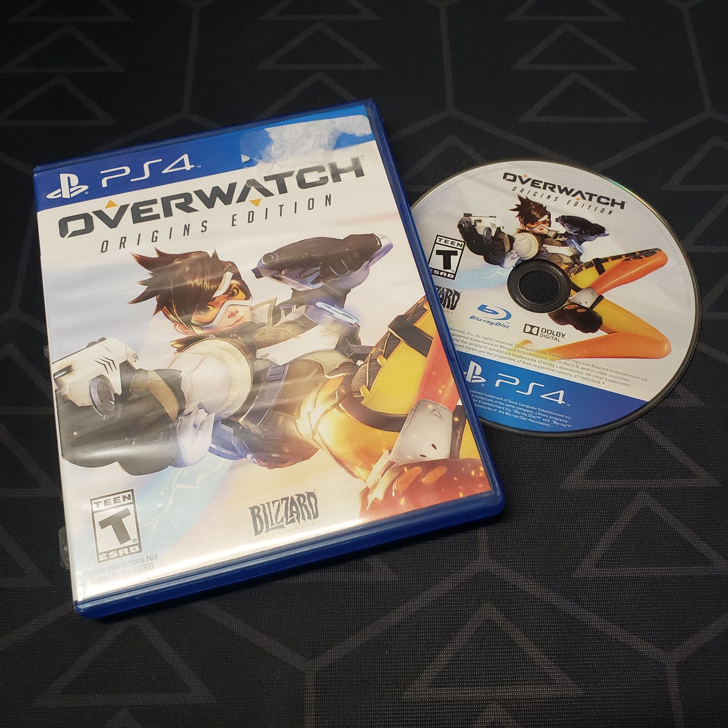 Image shows the case and disc for the video game Overwatch: Origins Edition for Playstation 4