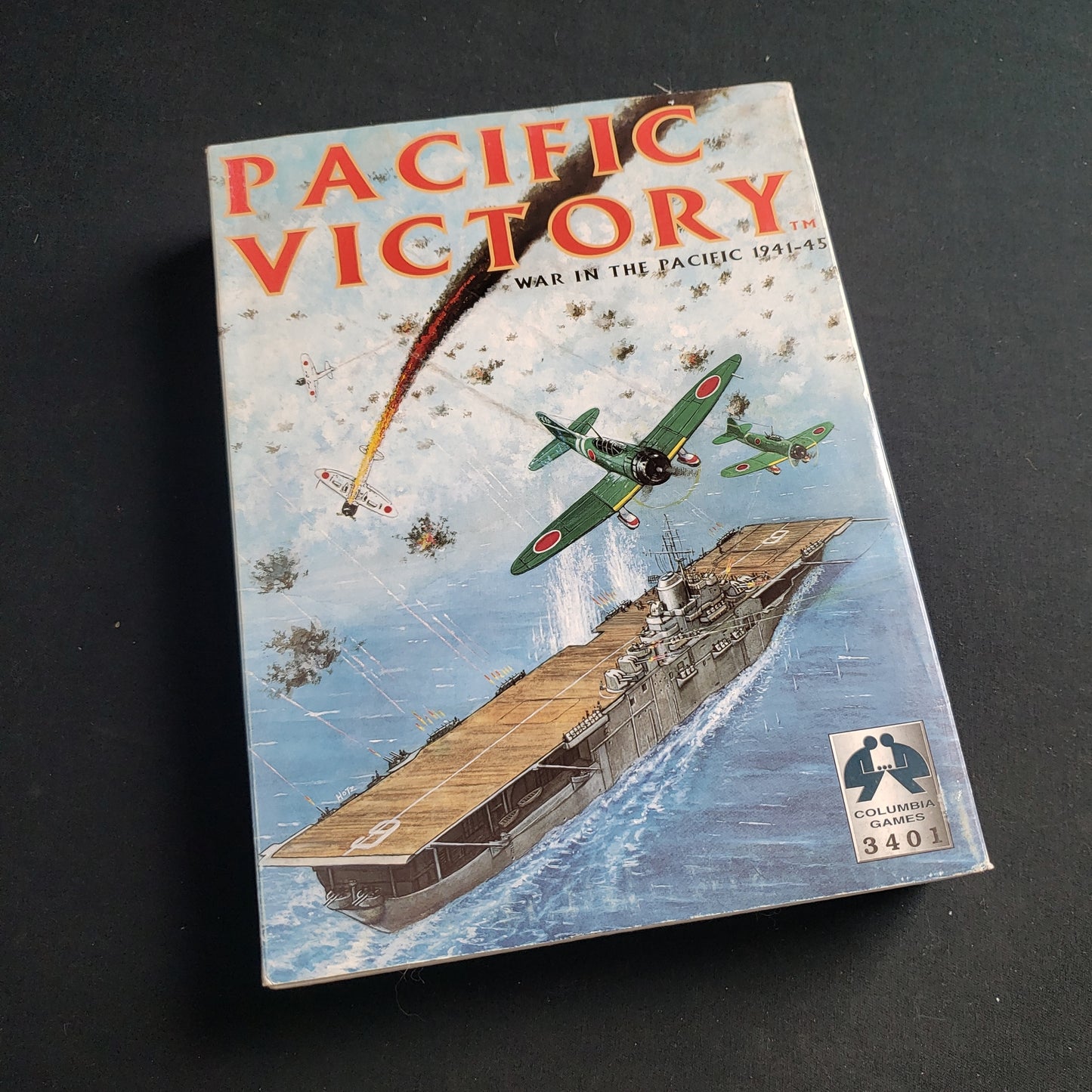 Image shows the front cover of the box of the Pacific Victory board game