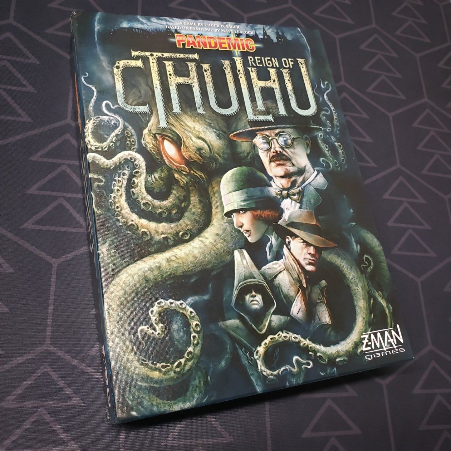 Image shows the front cover of the box of the Pandemic: Reign of Cthulhu board game