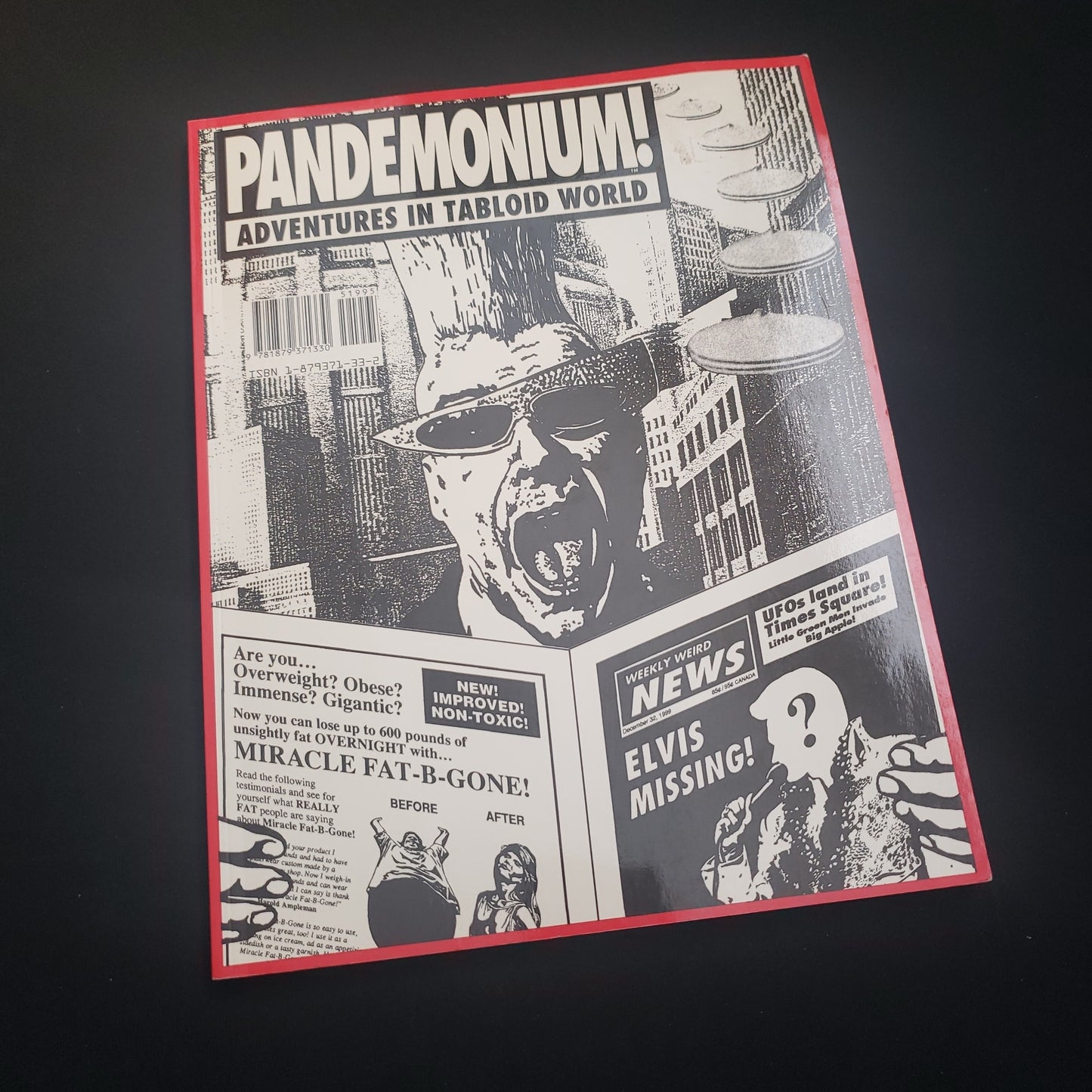 Image shows the front cover of the Pandemonium: Adventures in Tabloid World roleplaying game book