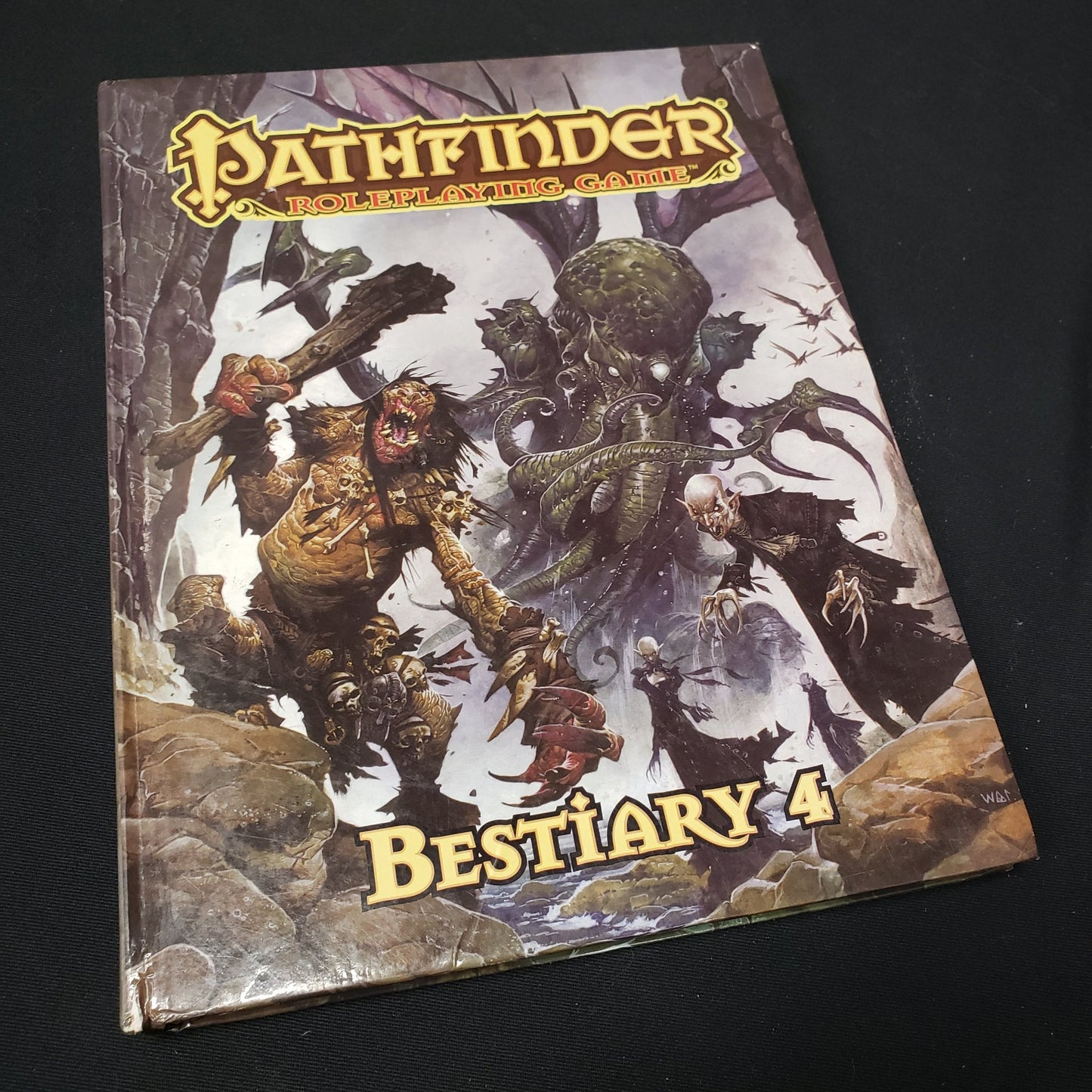 Image shows the front cover of the Bestiary 4 book for the roleplaying game Pathfinder 1E