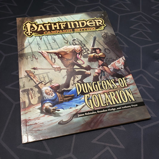 Image shows the front cover of the Dungeons of Golarion book for the roleplaying game Pathfinder 1E
