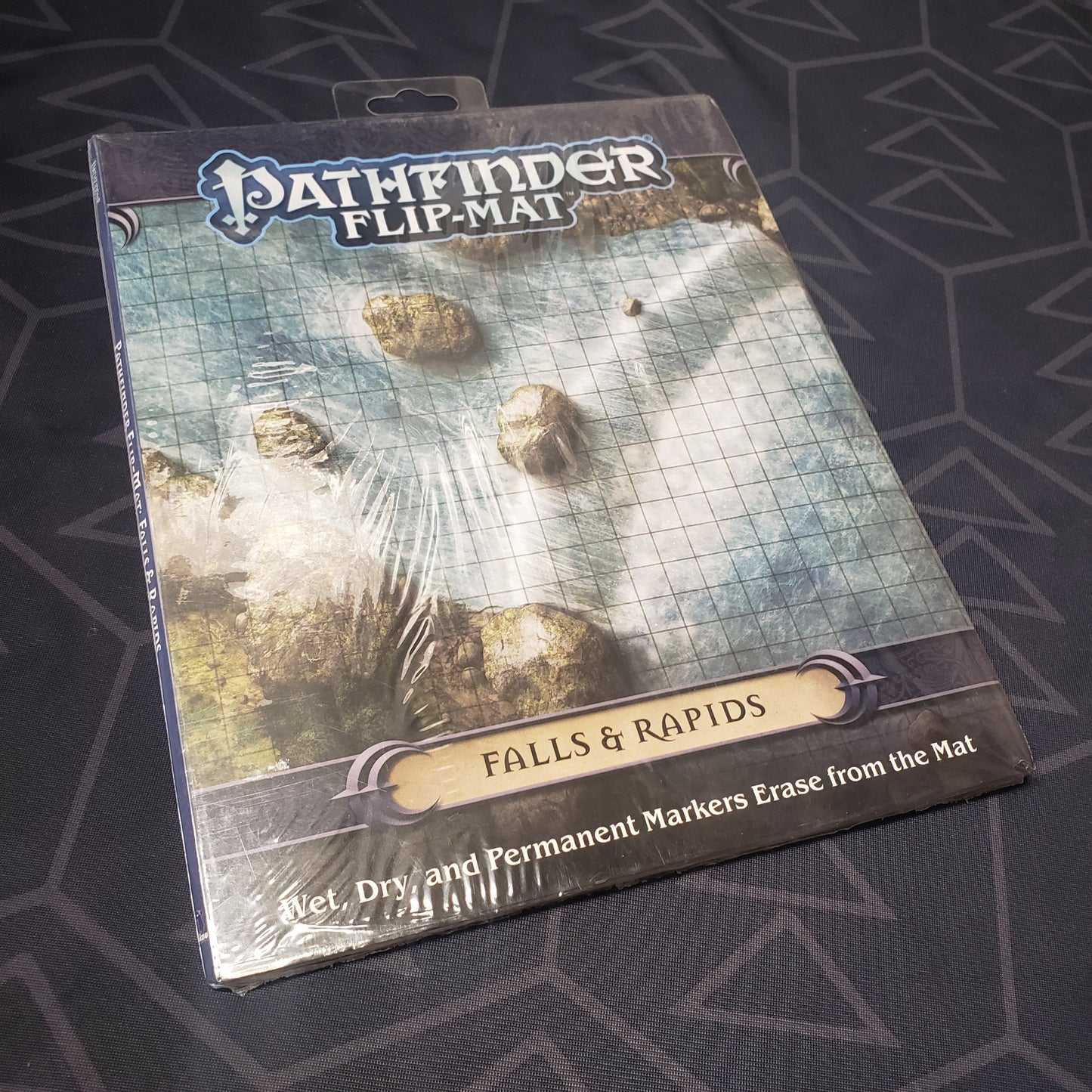 Image shows the front of the packaging of the Flip-Mat: Falls & Rapids map folio for the roleplaying game Pathfinder 1E