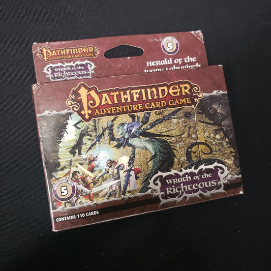Image shows the front of the box of the Wrath of the Righteous: Adventure Deck 5 - Herald of the Ivory Labyrinth for the Pathfinder Adventure Card Game