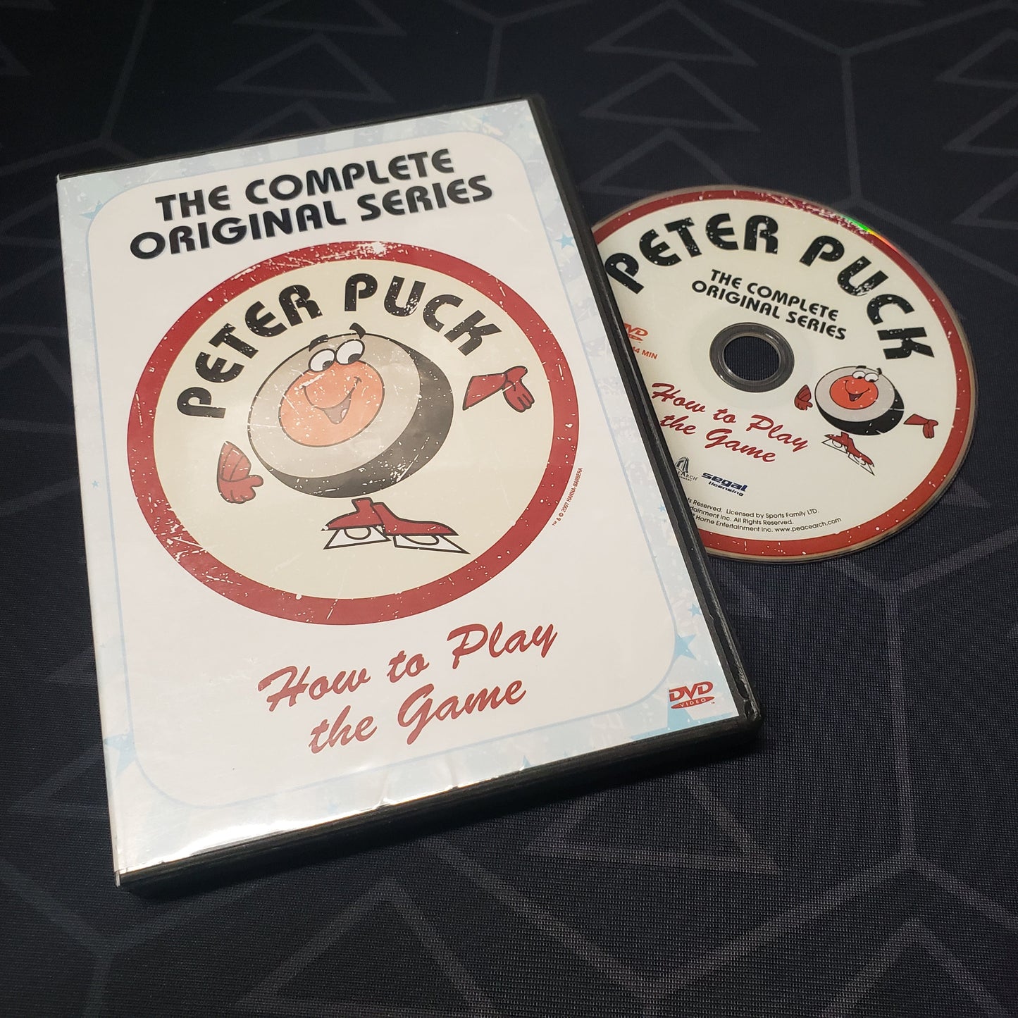 Image shows the case & disc for the Complete Original Series set for the tv show Peter Puck: How to Play the Game on DVD
