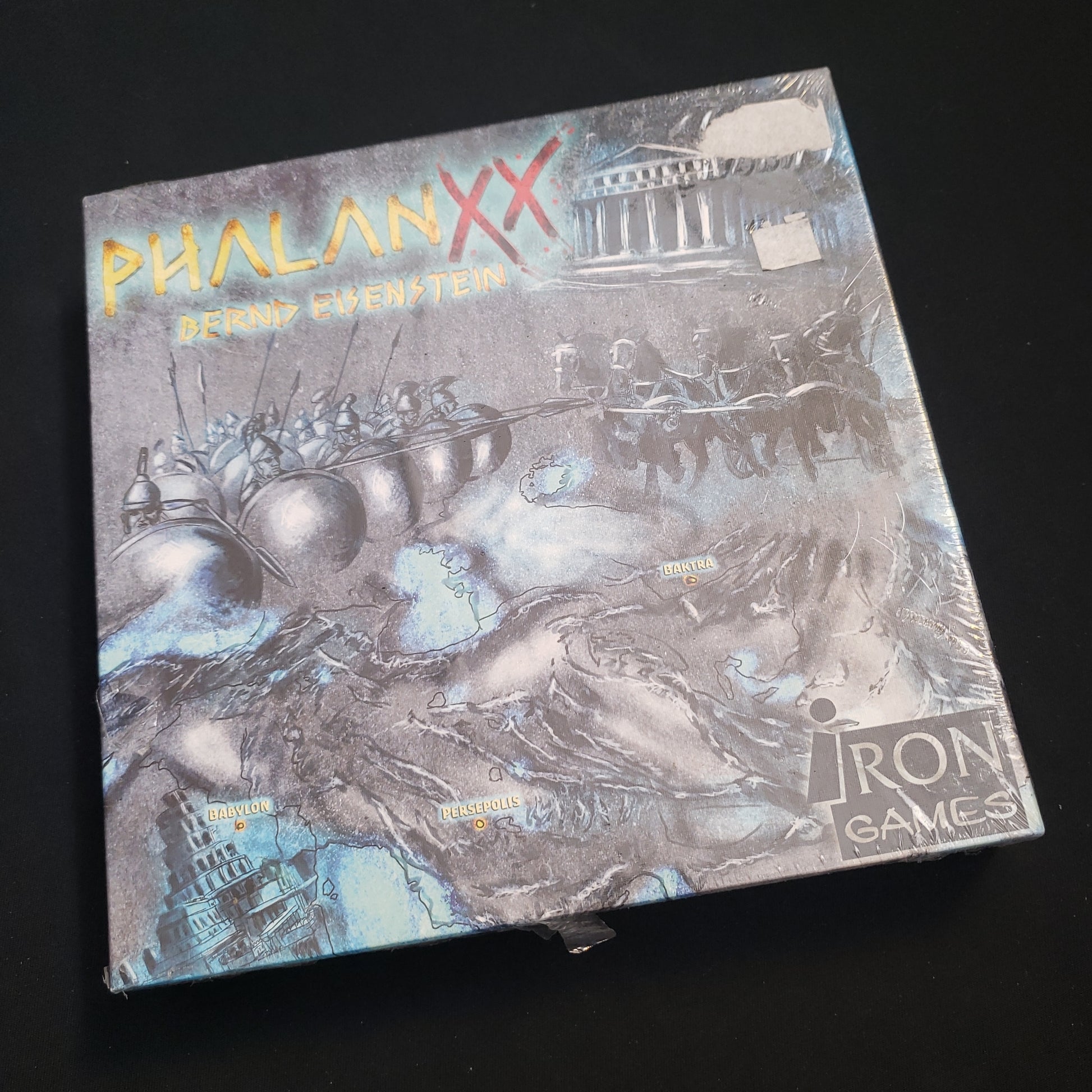 Image shows the front cover of the box of the Phalanxx board game