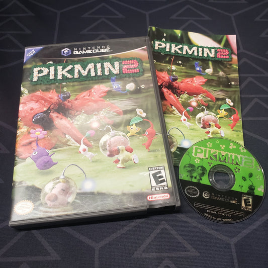 Image shows the case, manual and disc for the video game Pikmin 2 for Nintendo GameCube