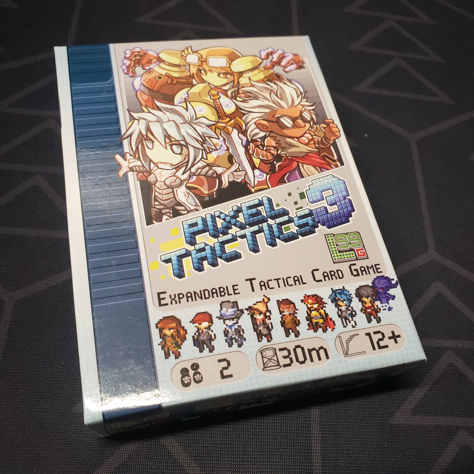 Image shows the front cover of the box for the Pixel Tactics 3 card game