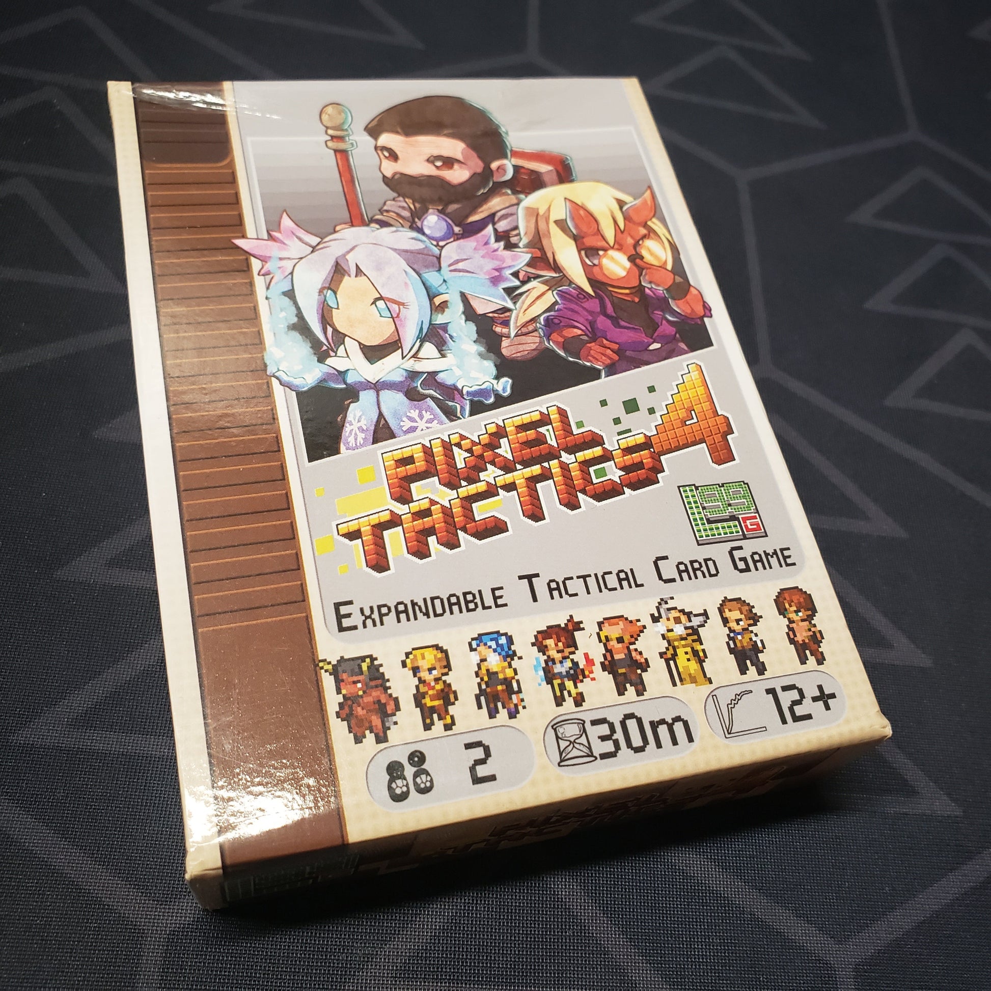 Image shows the front cover of the box for the Pixel Tactics 4 card game