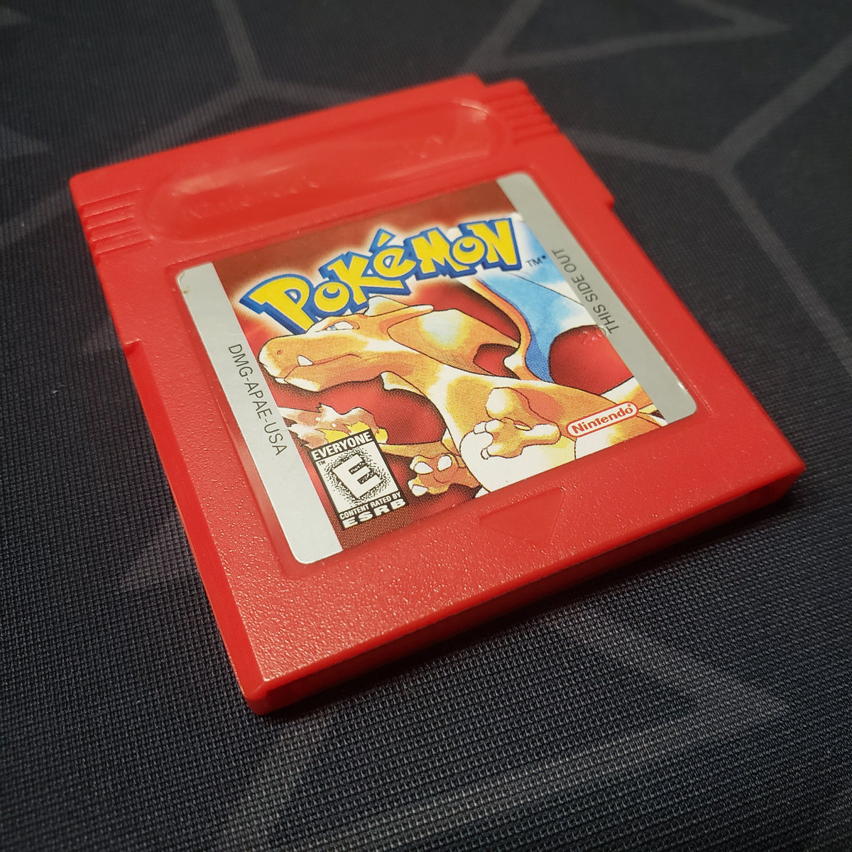 Image shows the outside of the cartridge for the game Pokemon Red for Nintendo Game Boy