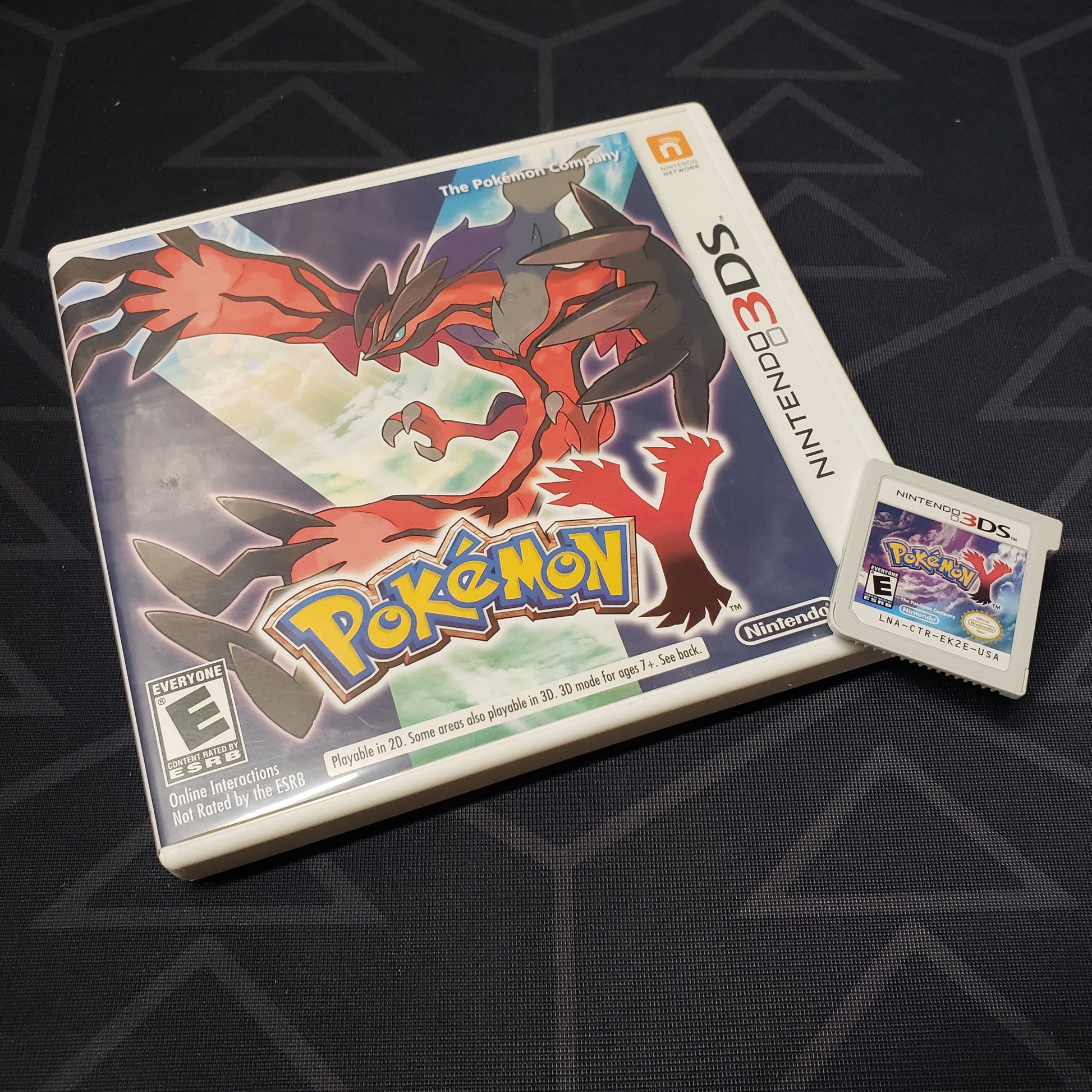 Image shows the case & cartridge for the game Pokemon Y for Nintendo 3Ds