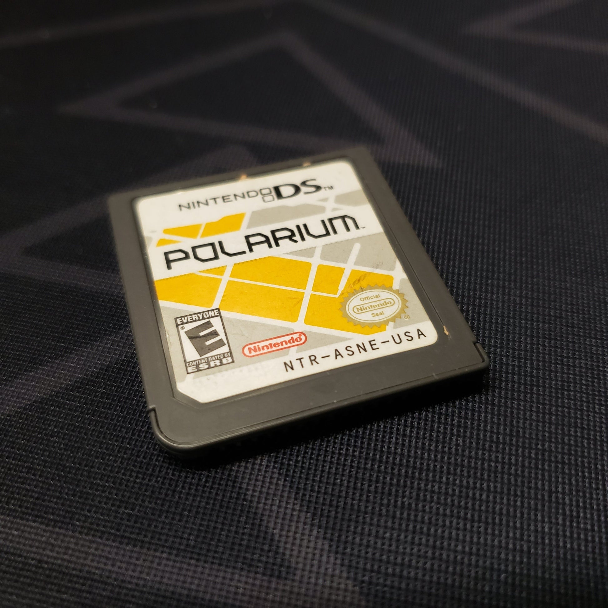 Image shows the front of the cartridge for the video game Polarium for Nintendo DS