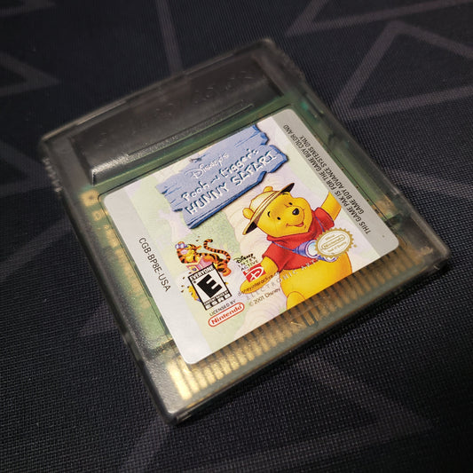 Image shows the front of the cartridge for the video game Pooh and Tigger's Hunny Safari for Nintendo Game Boy Color