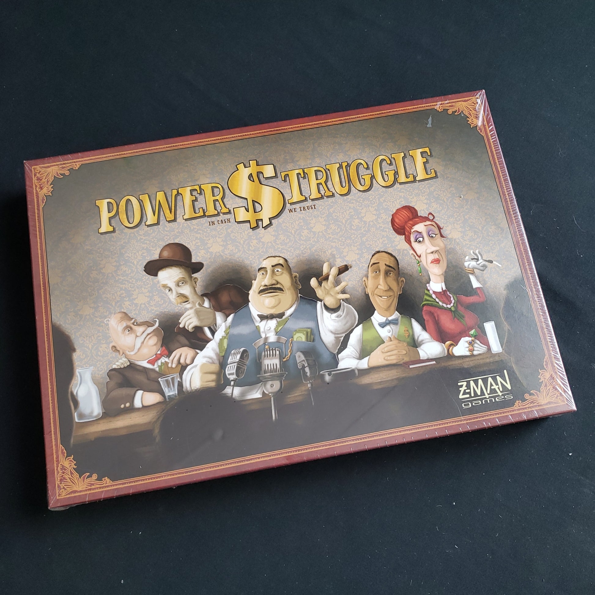 Image shows the front cover of the box of the Power Struggle board game