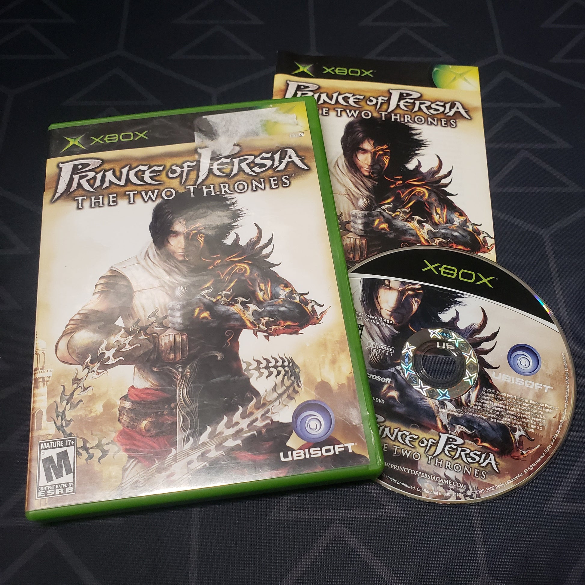 Image shows the case, manual and disc for the video game Prince of Persia: The Two Thrones for the original Xbox