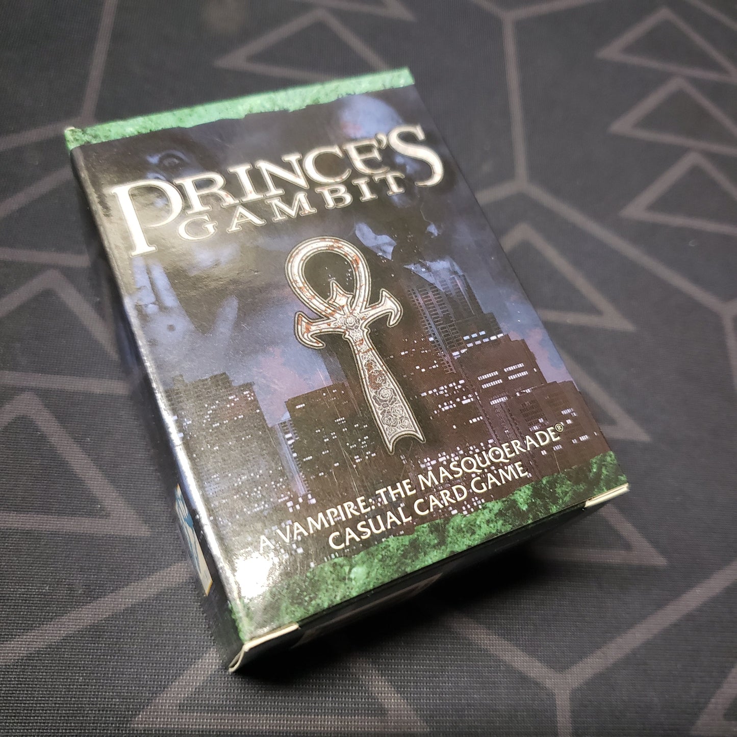 Image shows the front cover of the box for the Prince's Gambit card game