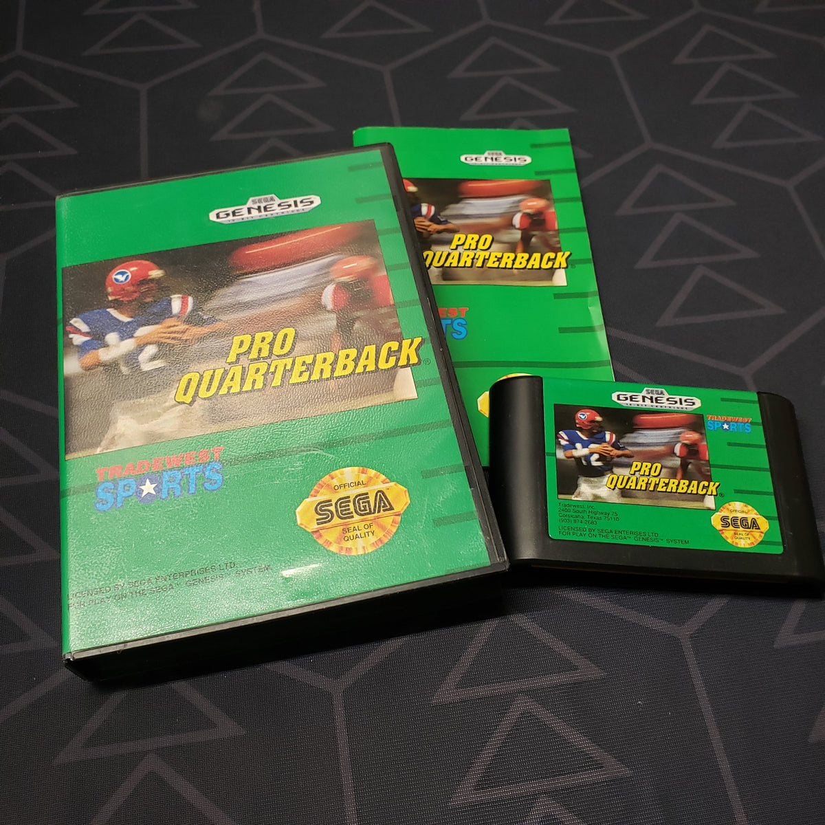 Image shows the case, manual and cartridge for the video game Pro Quarterback for Sega Genesis