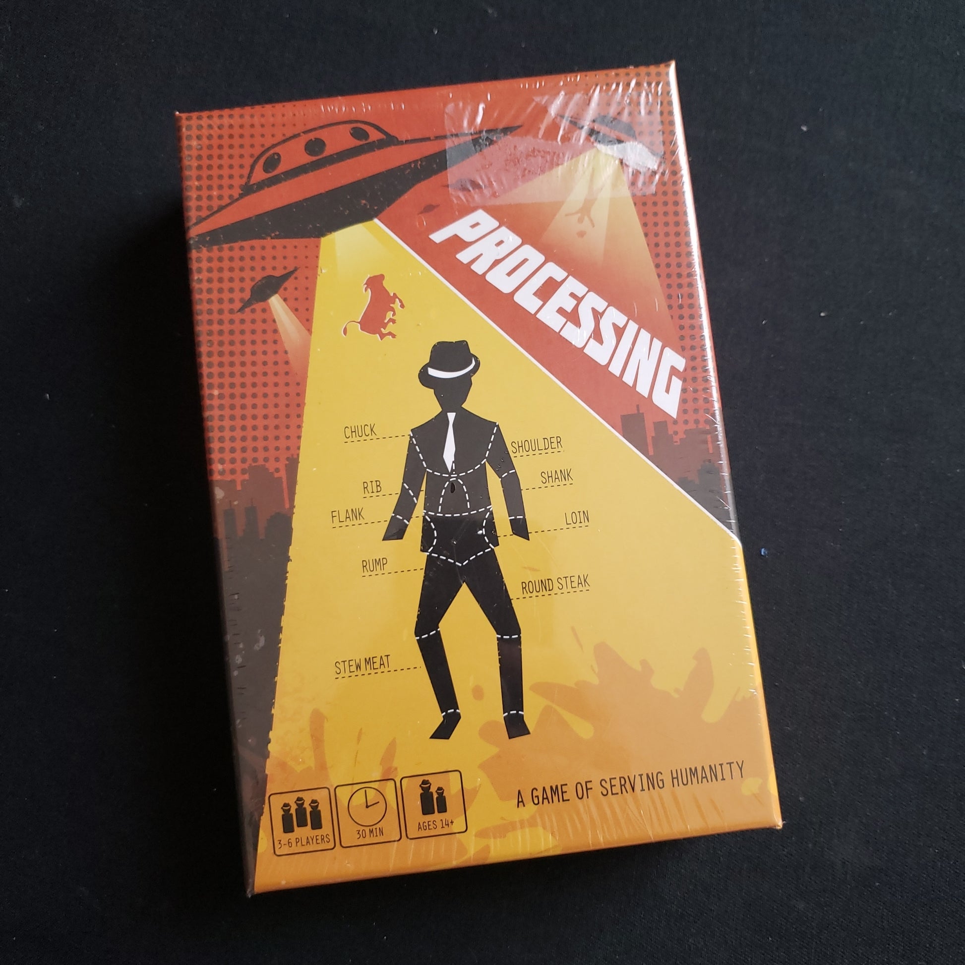 Image shows the front cover of the box of the Processing board game