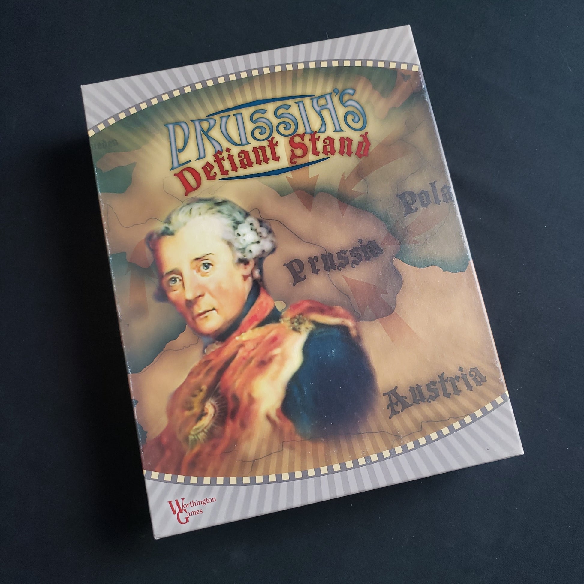 Image shows the front cover of the box of the Prussia's Defiant Stand board game