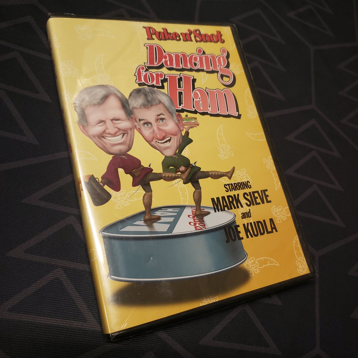 Image shows the front of the case for the movie Puke n' Snot: Dancing for Ham on DVD