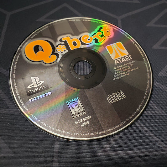 Image shows the label side of the game disc for the video game Q*Bert for Playstation 1