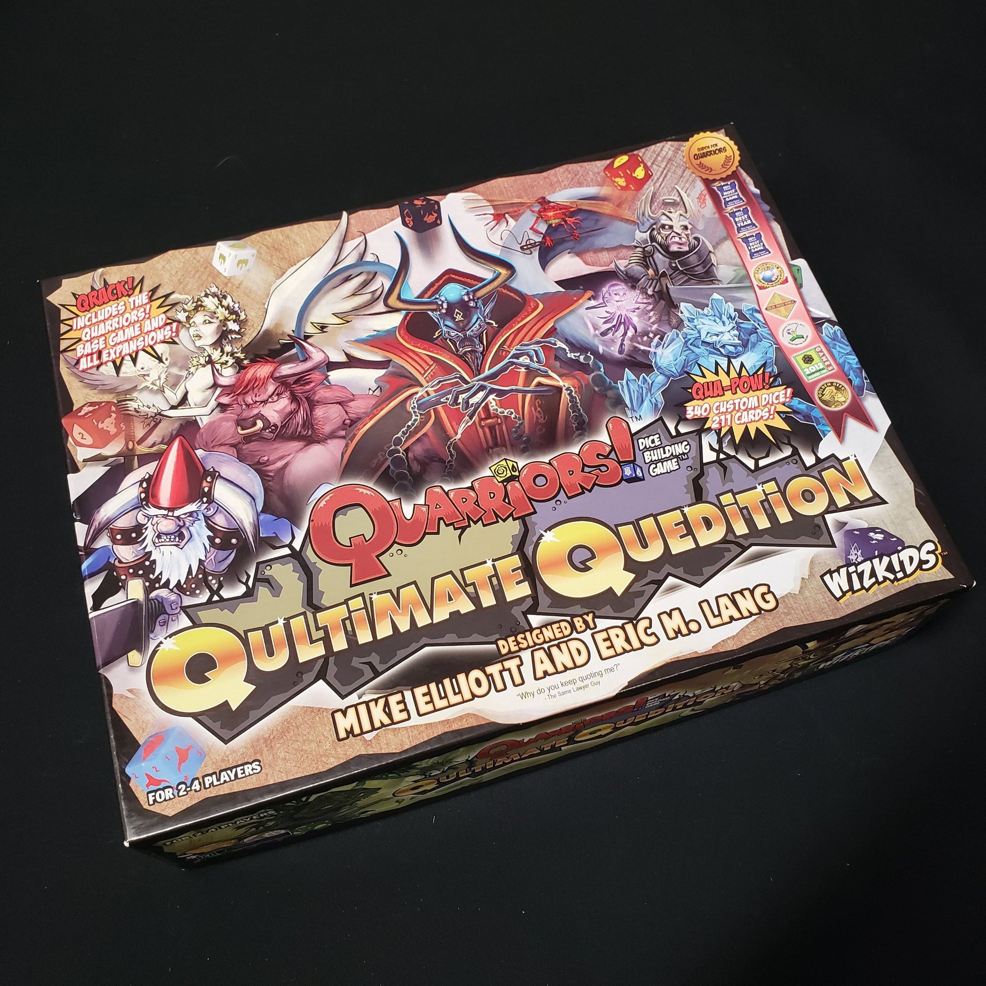 Image shows the front cover of the box of the Quarriors!: Qultimate Quedition board game