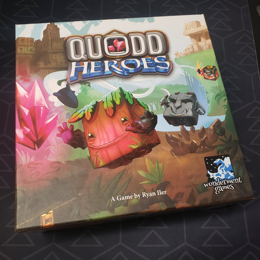 Image shows the front cover of the box for the Quodd Heroes board game