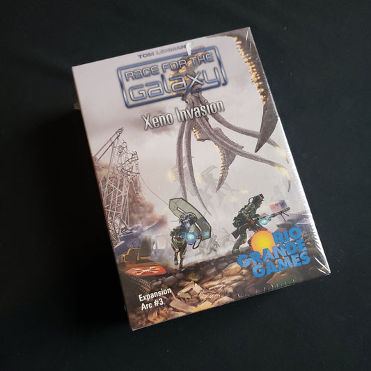 Image shows the front cover of the box of the Xeno Invasion expansion for the Race for the Galaxy board game