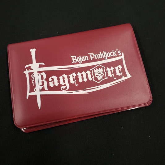 Image shows the front cover of the box of the Ragemore card game