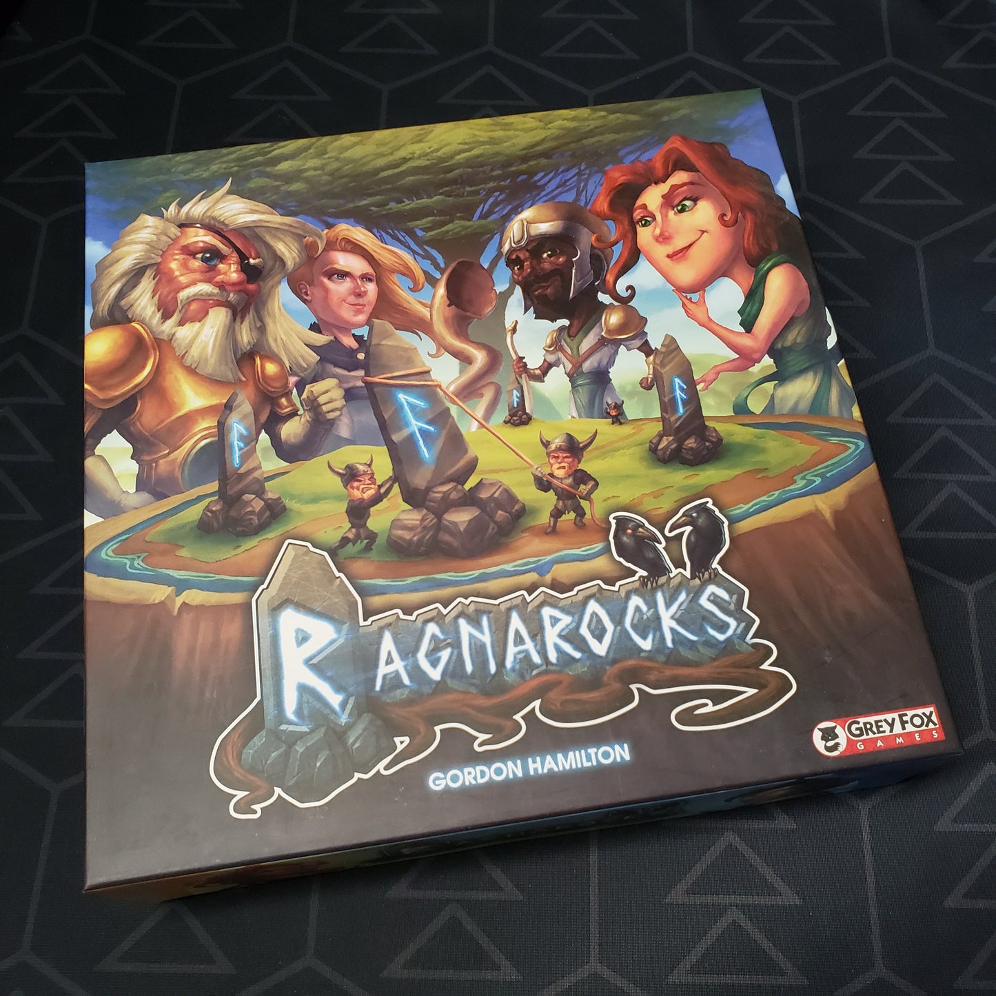 Image shows the front cover of the box for the Ragnarocks board game
