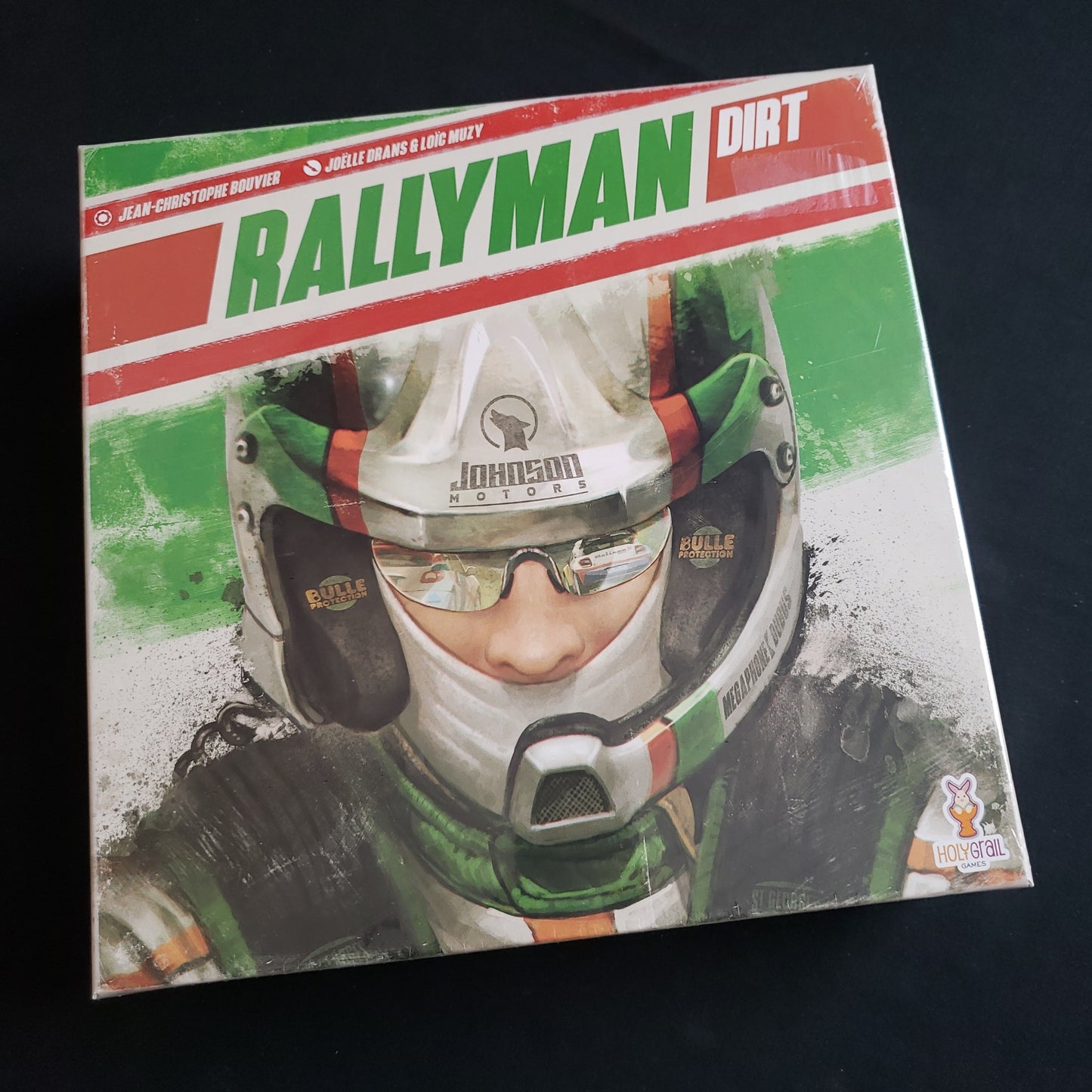 Image shows the front cover of the box of the Rallyman: DIRT board game