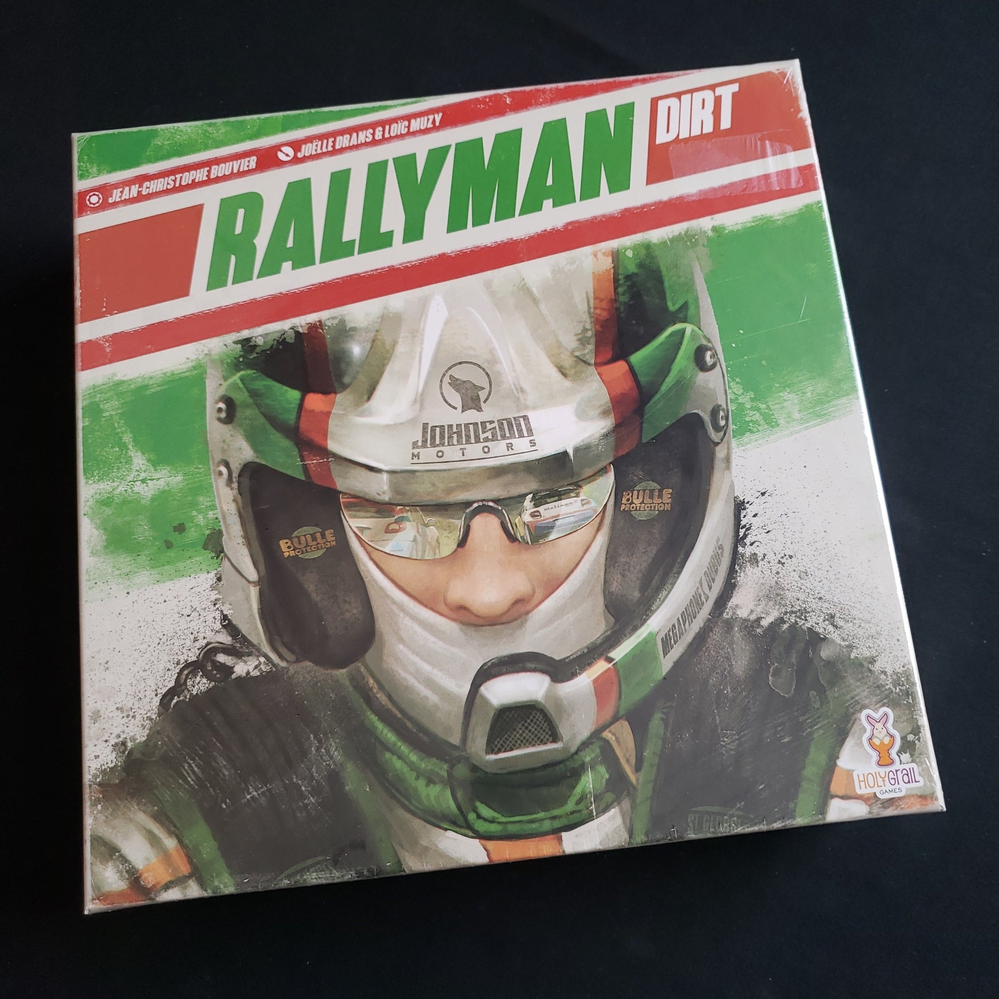 Image shows the front cover of the box of the Rallyman: DIRT board game