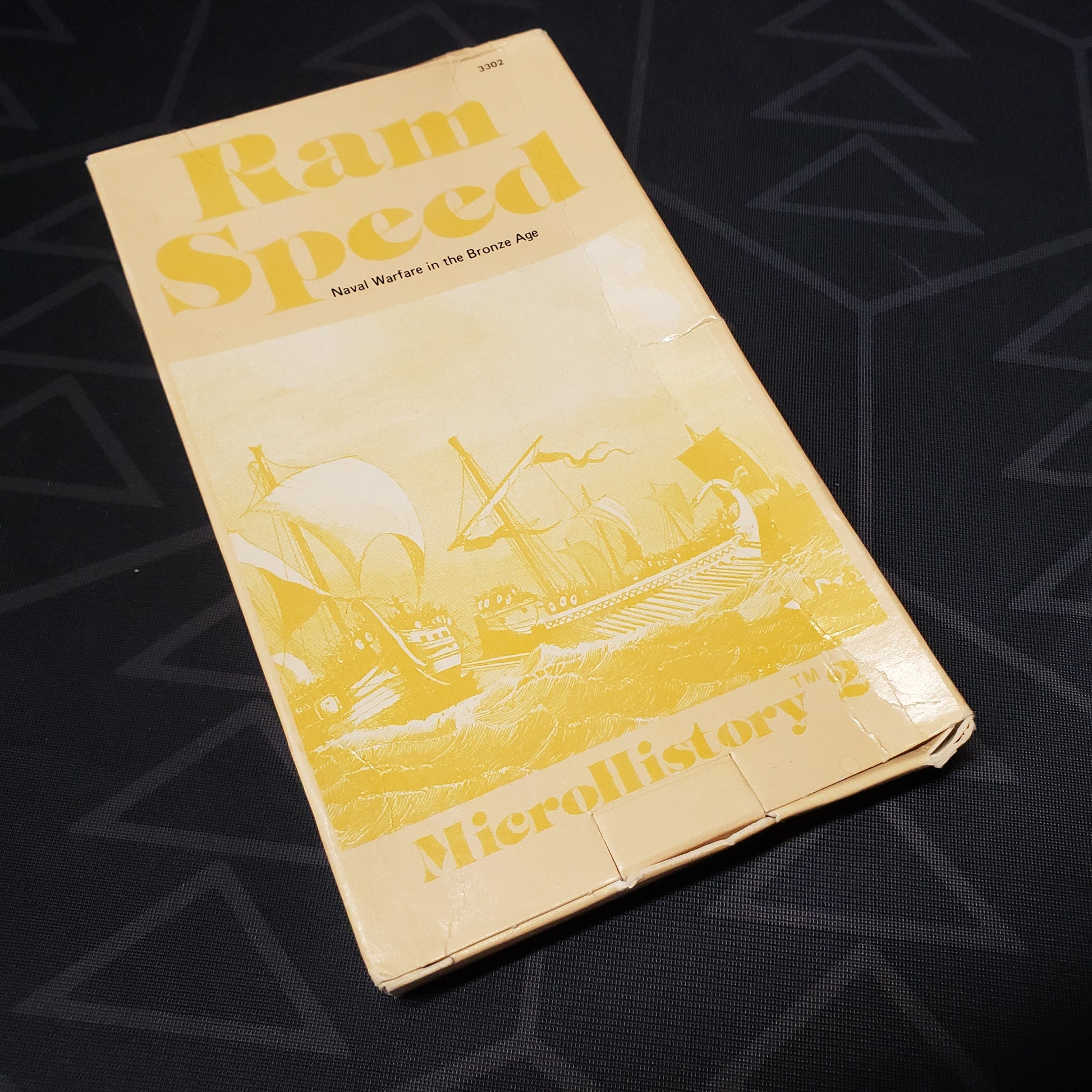 Image shows the front cover of the box for the Ram Speed board game