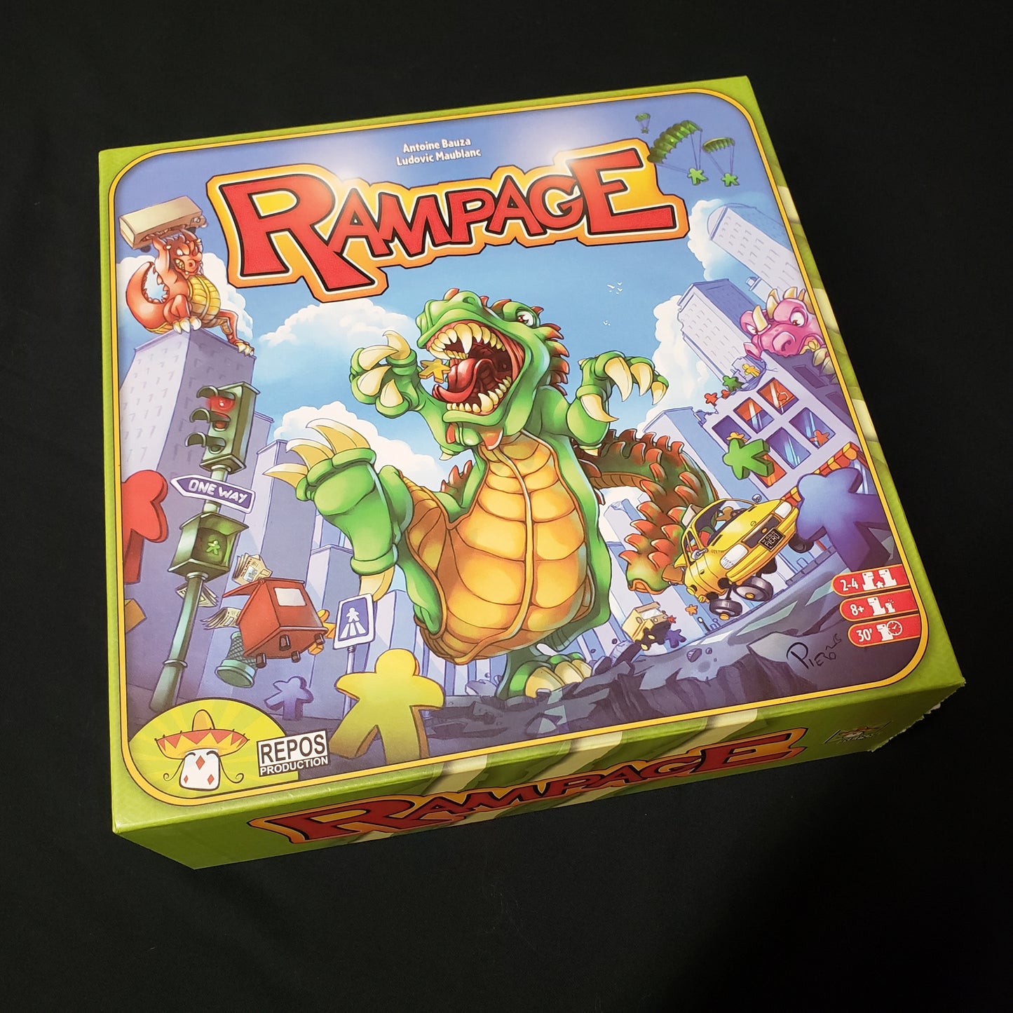 Image shows the front cover of the box of the Rampage board game