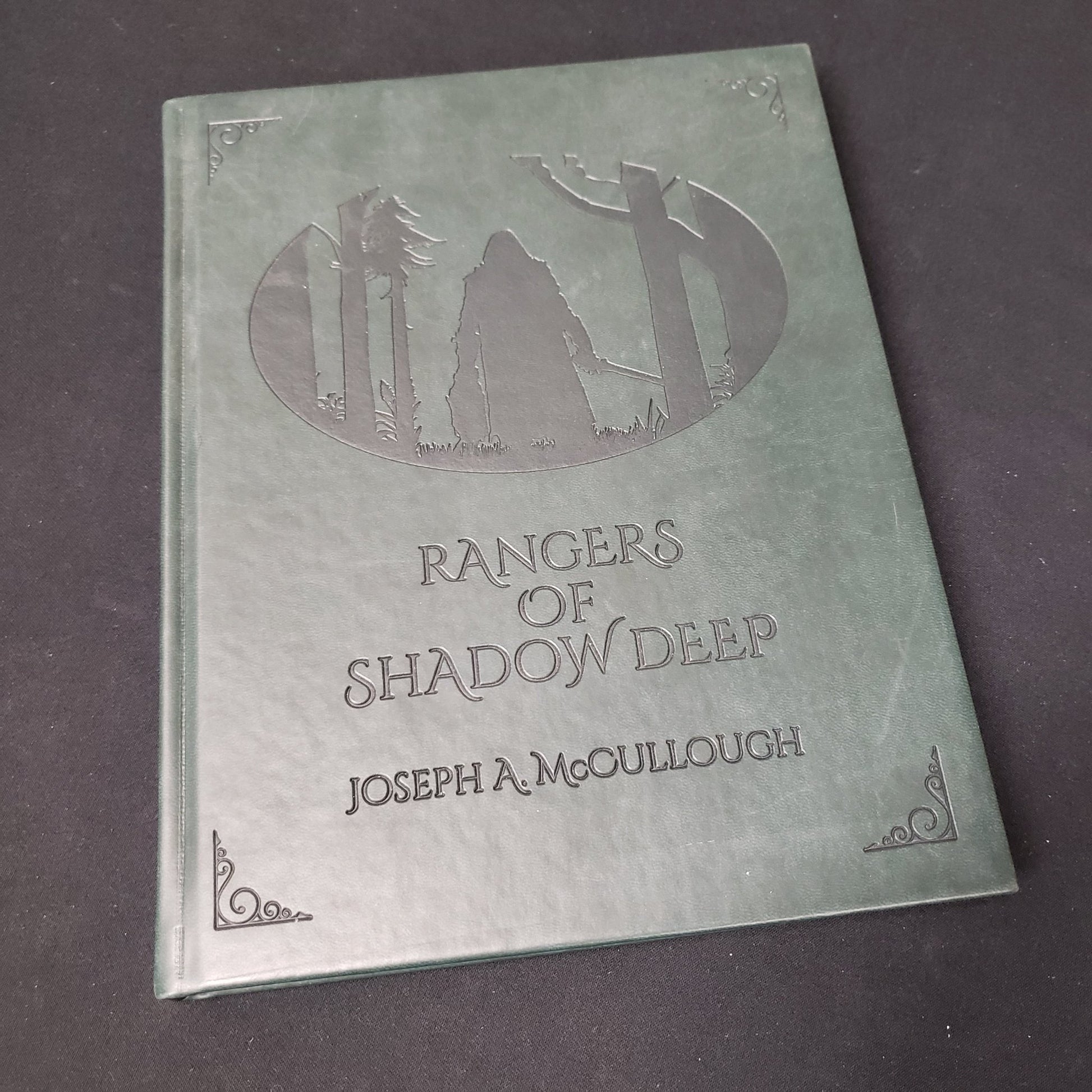 Image shows the front cover of the Rangers of Shadow Deep roleplaying game book