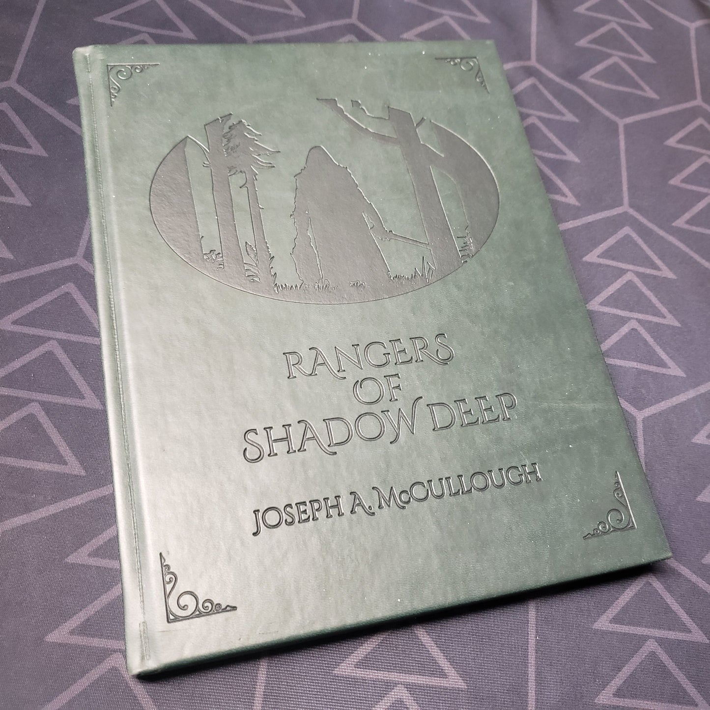 Image shows the front cover of the Rangers of Shadow Deep roleplaying game book