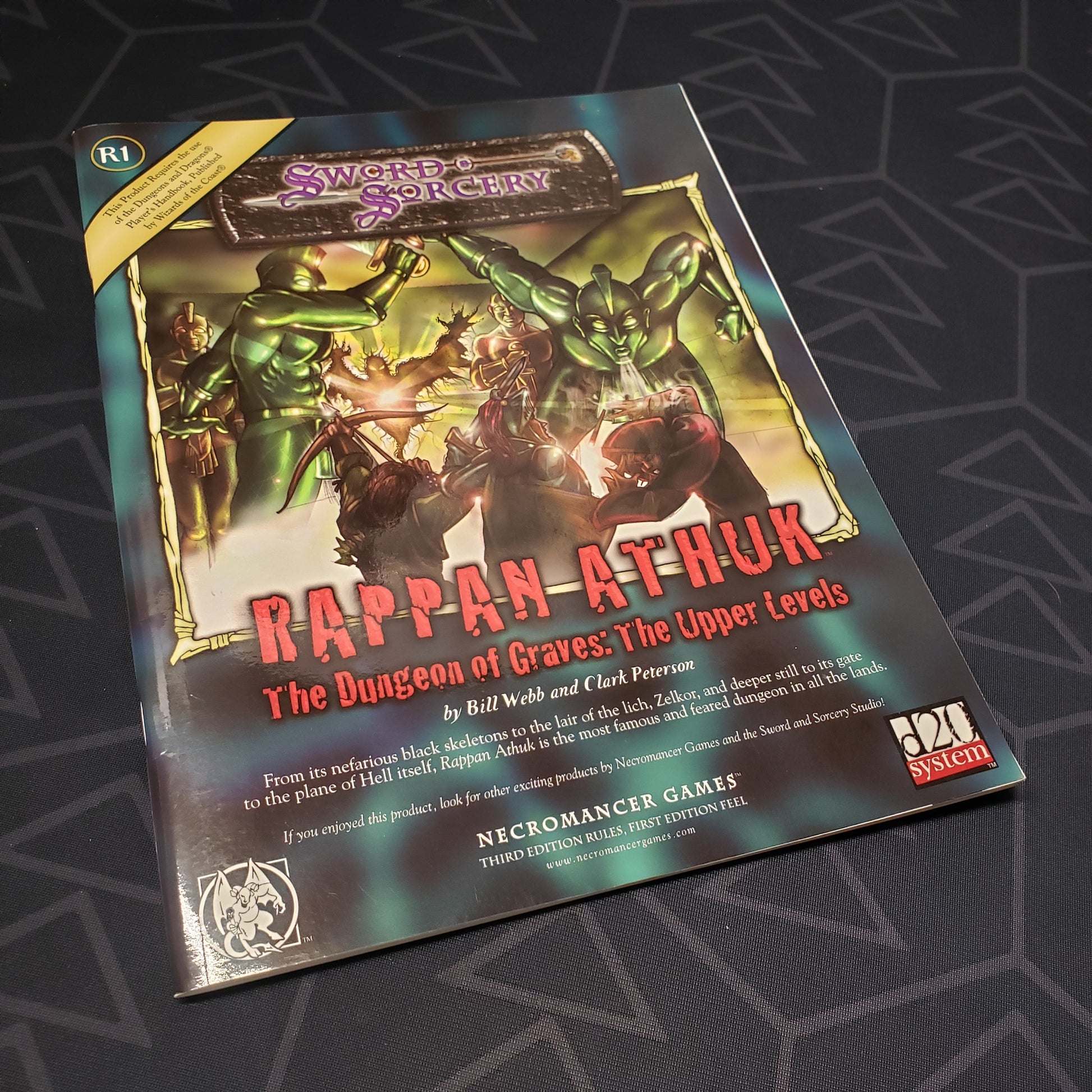 Image shows the front cover of the Rappan Athuk R1: The Dungeon of Graves - The Upper Levels roleplaying game book